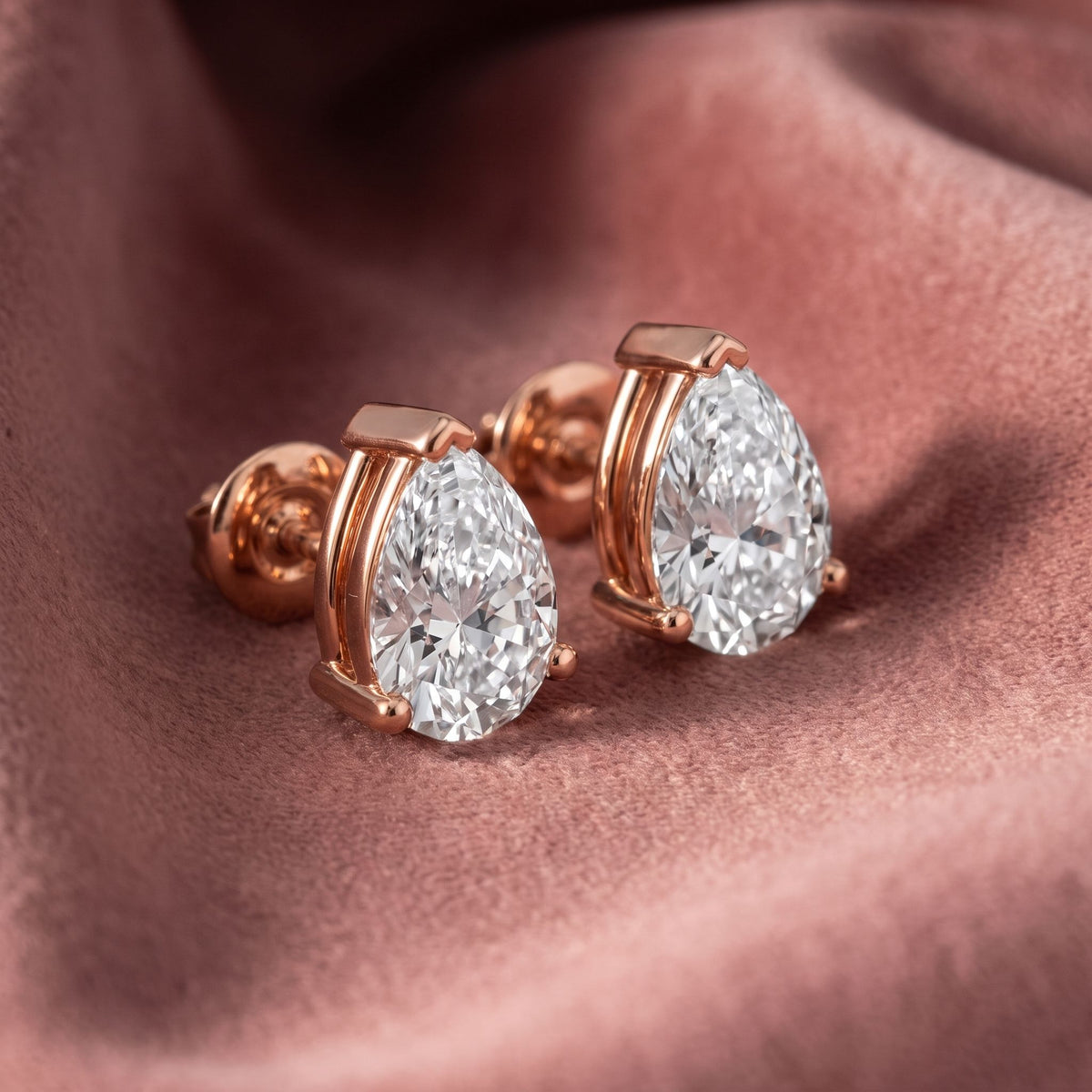 18K Solitaire Pear Diamond Earrings — AI cloth, in-house