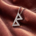 18K Berkana Viking Diamond Pendant — AI cloth, in-house