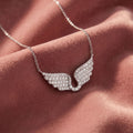 18K Angel Wings Pave Diamond Pendant — AI cloth, in-house