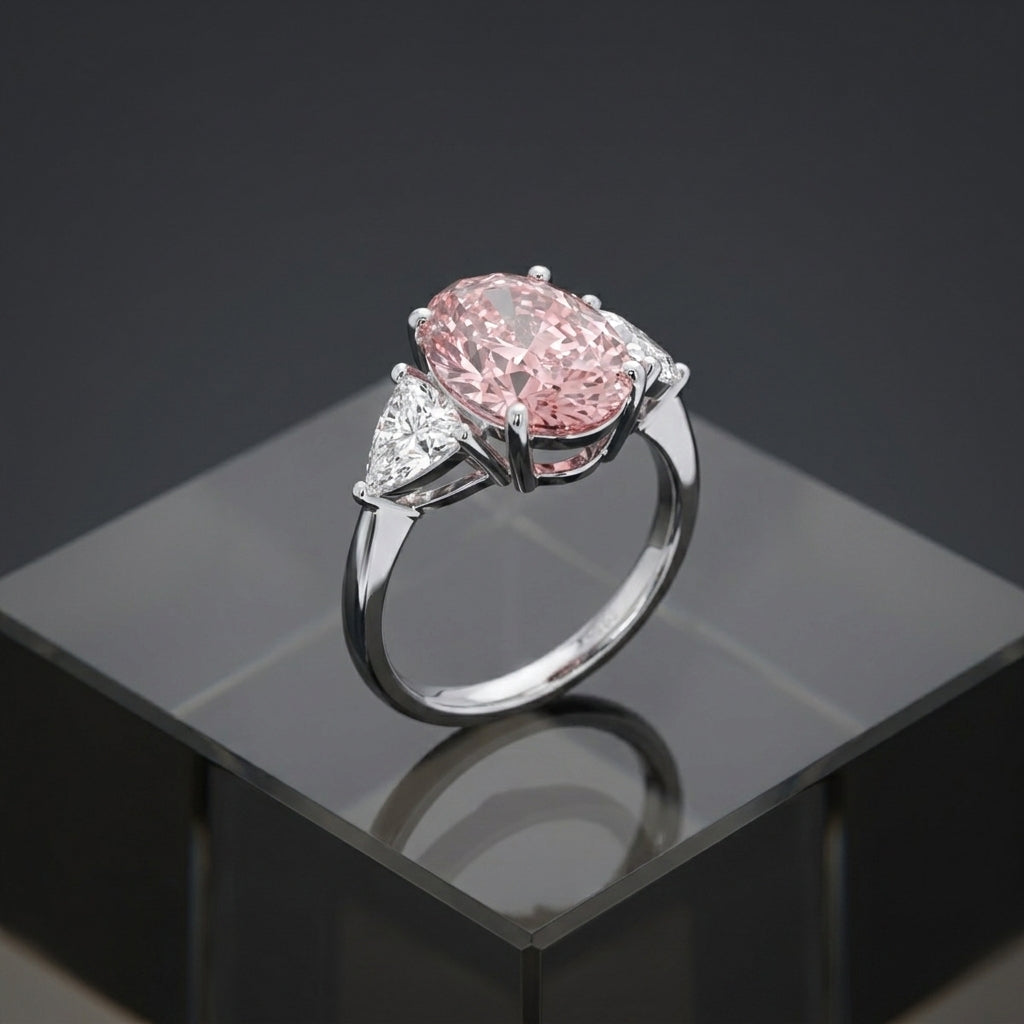 18K White Gold Trilogy Oval Diamond Ring