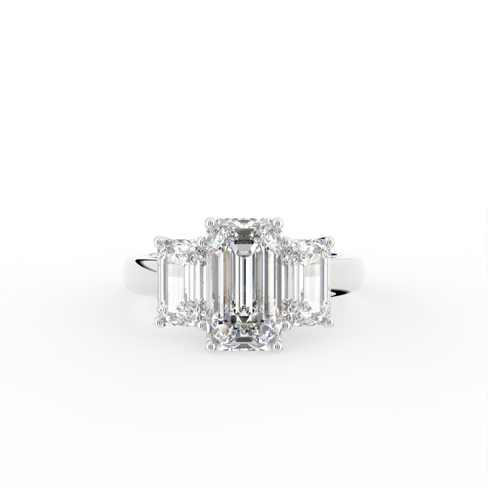 18K Trilogy Emerald Cut Diamond Ring