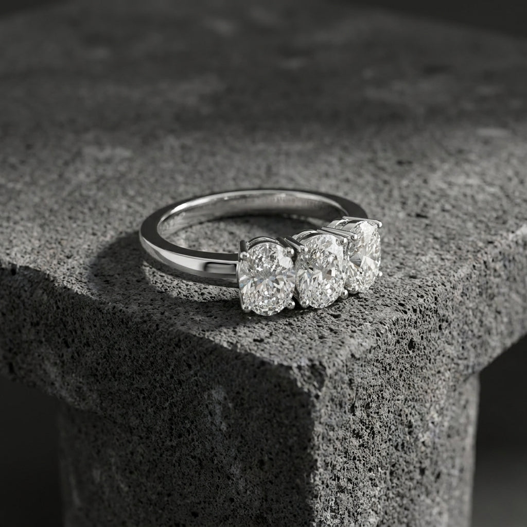 18K White Gold Trilogy Oval Diamond Ring