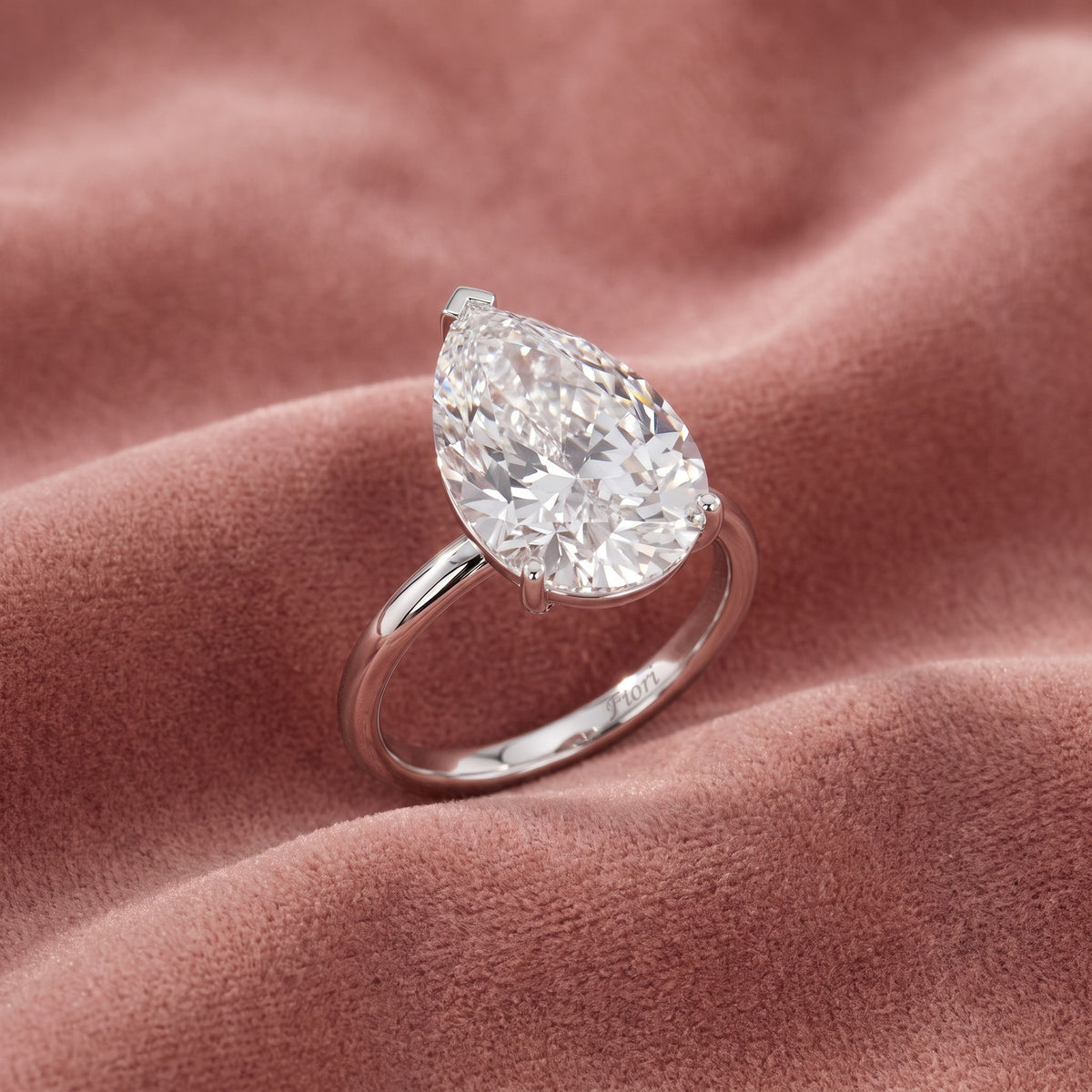 18K Solitaire Pear Diamond Ring — AI cloth, in-house