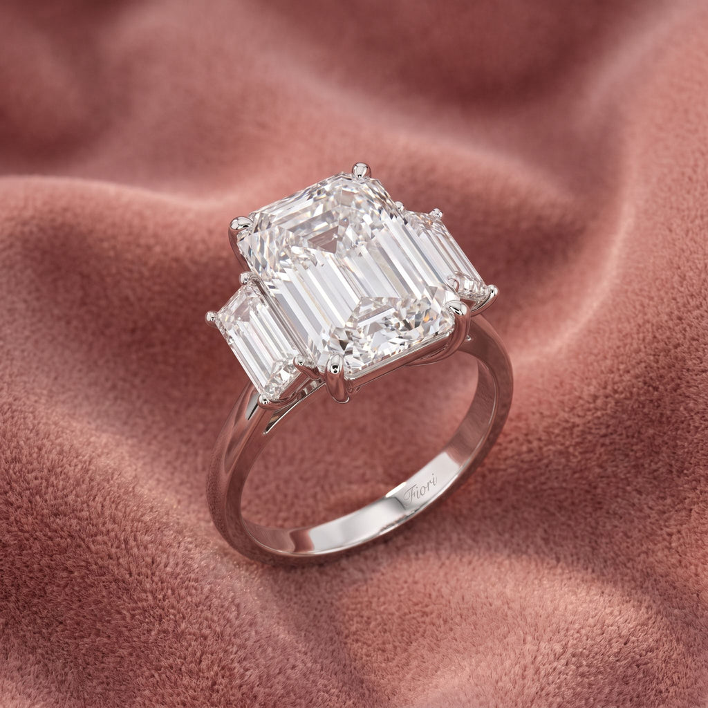 18K Trilogy Emerald Cut Diamond Ring — AI cloth, in-house