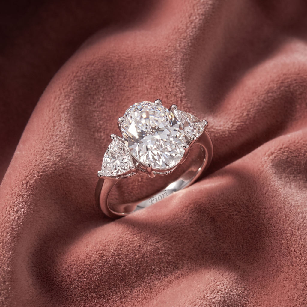 18K Trilogy Oval Diamond Ring — AI cloth, in-house