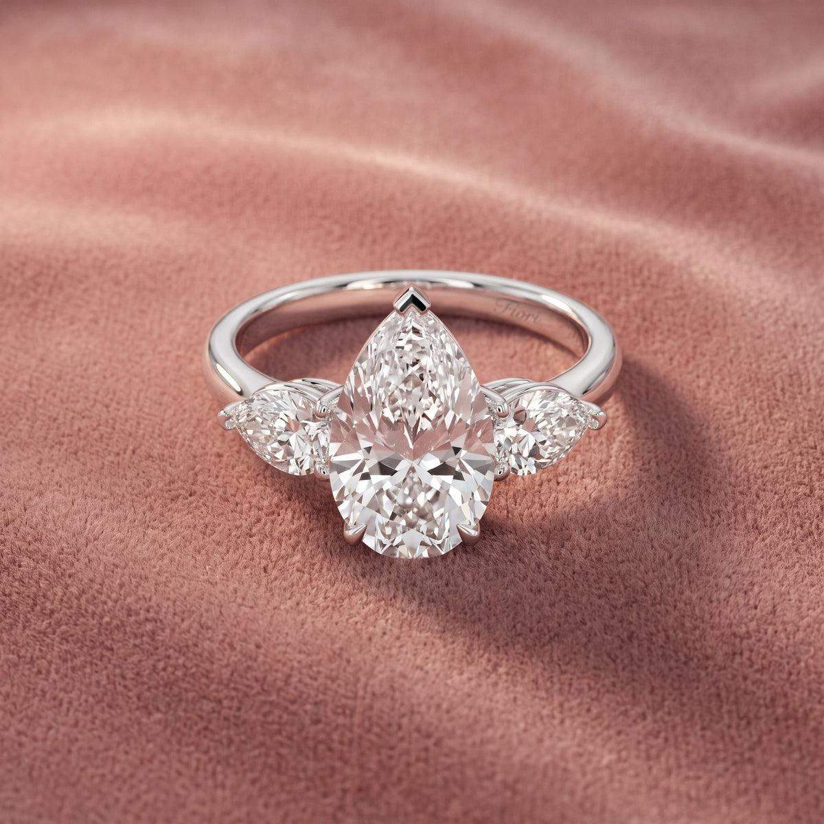 18K Trilogy Pear Diamond Ring — AI cloth, in-house