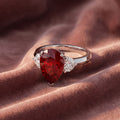 18K Trilogy Pear Diamond Ring — AI cloth, in-house