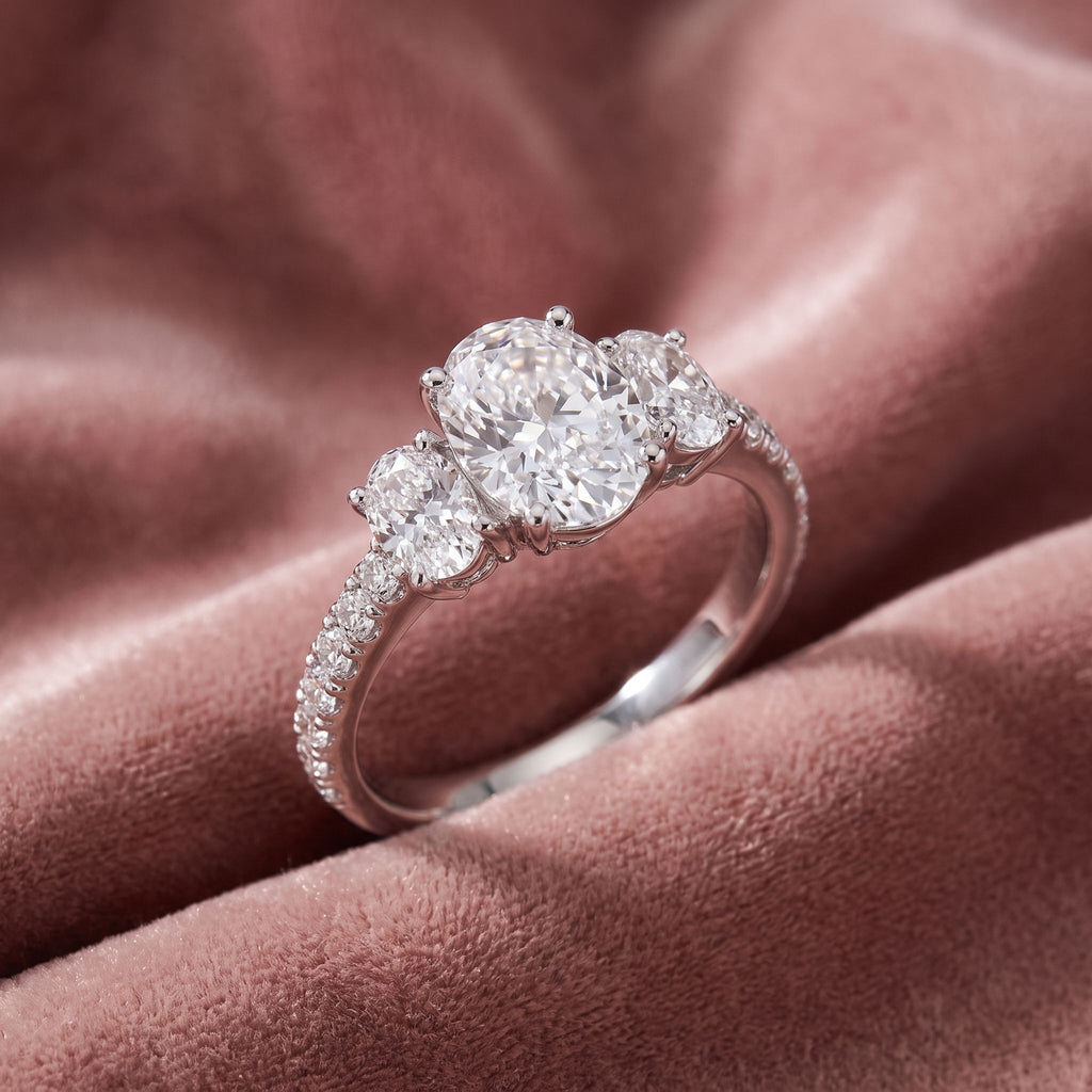 18K Trilogy Oval Diamond Ring — AI cloth, in-house