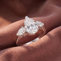 18K Trilogy Pear Diamond Engagement Ring — AI cloth, in-house