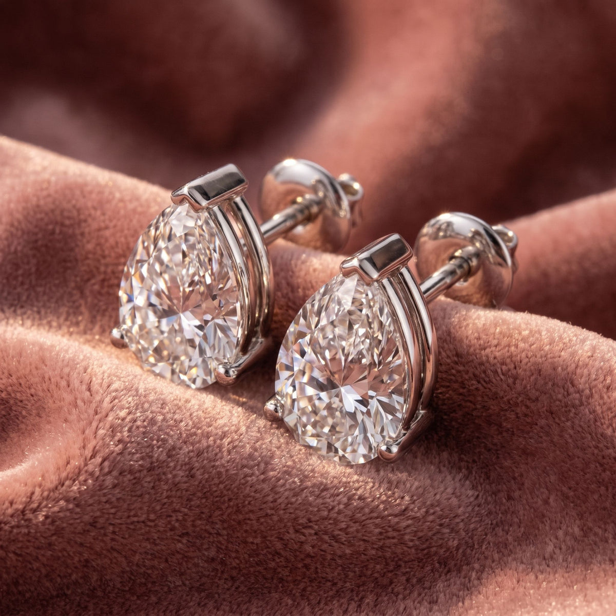 18K Solitaire Pear Diamond Earrings — AI cloth, in-house