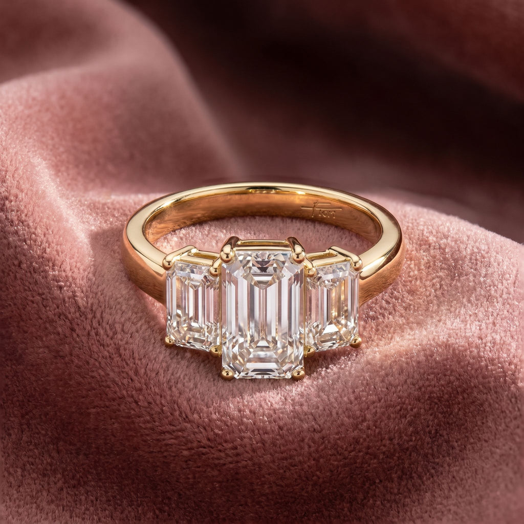 18K Trilogy Emerald Cut Diamond Ring — AI cloth, in-house