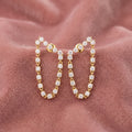 18K Diamond Hoop Earrings — AI cloth, in-house