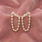 18K Diamond Hoop Earrings — AI cloth, in-house