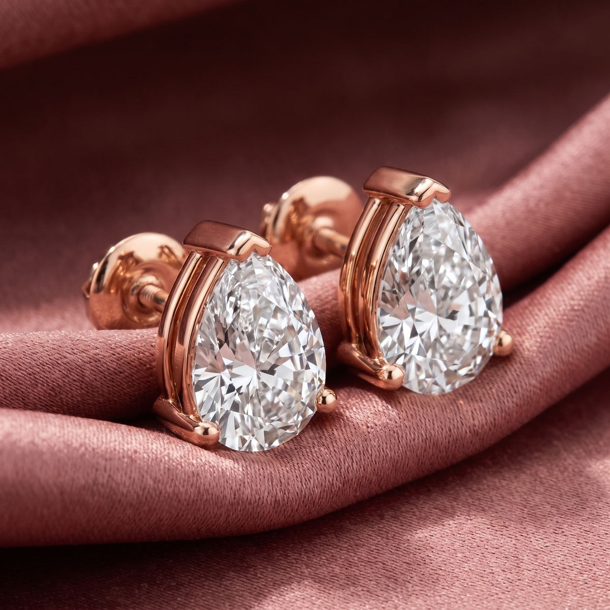 18K Solitaire Pear Diamond Earrings — AI cloth, in-house