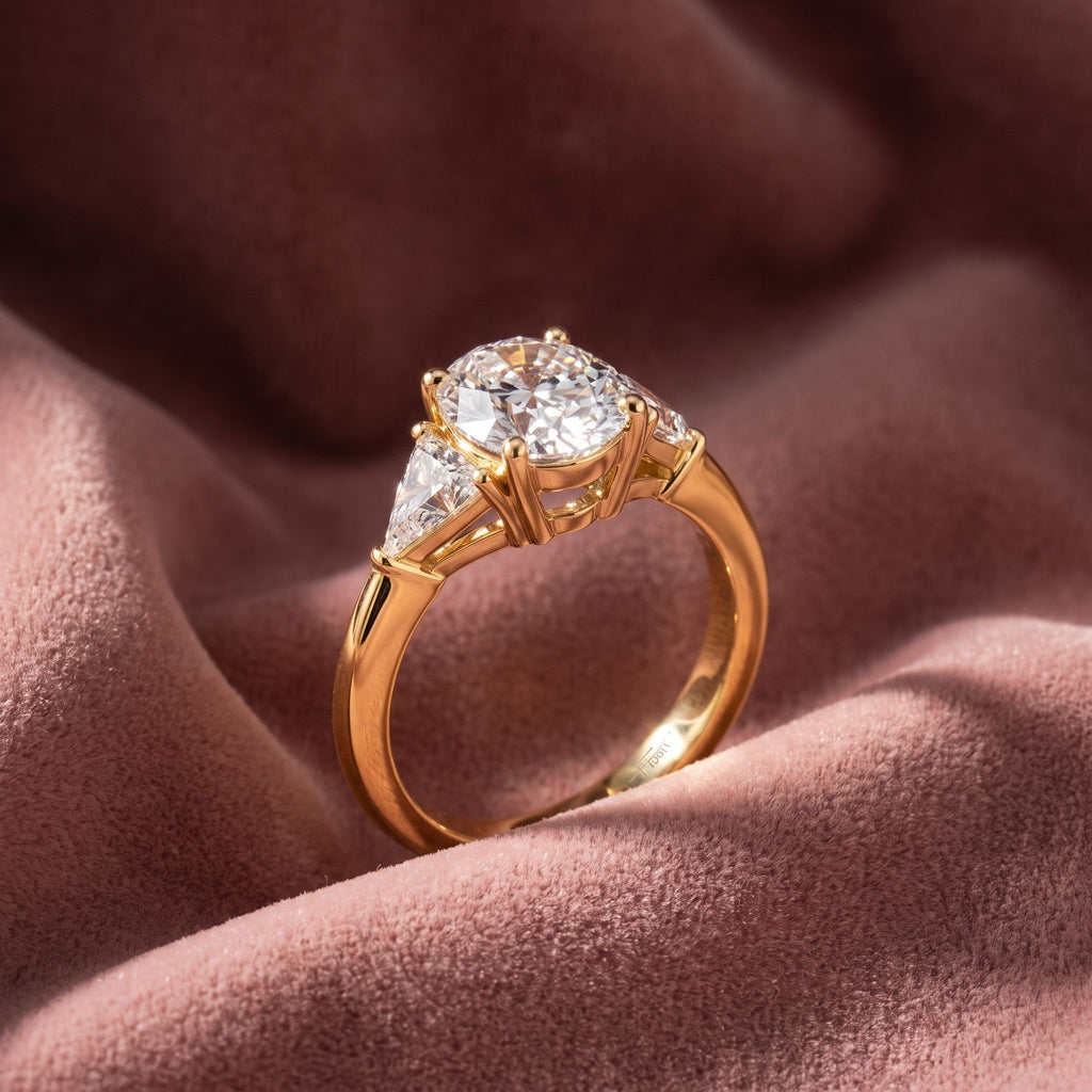 18K Trilogy Oval Diamond Ring — AI cloth, in-house