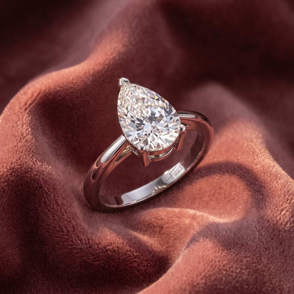 18K Solitaire Pear Diamond Ring — AI cloth, in-house