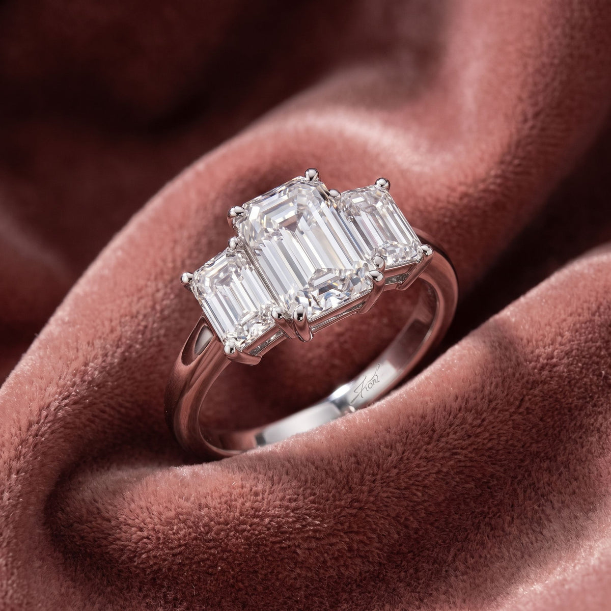18K Trilogy Emerald Cut Diamond Ring — AI cloth, in-house