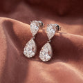 18K Diamond Drop Earrings — AI cloth, in-house