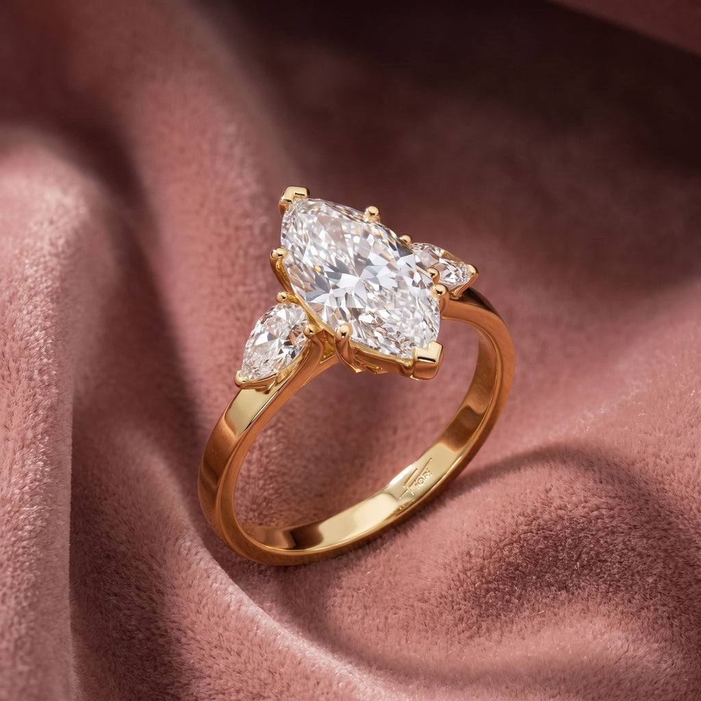 18K Trilogy Marquise Diamond Ring — AI cloth, in-house